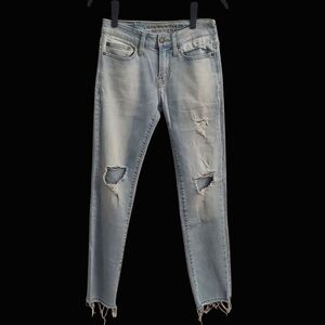 AMERICAN EAGLE OUTFITTERS Extreme Flex Light Blue Wash Distressed Skinny Jeans